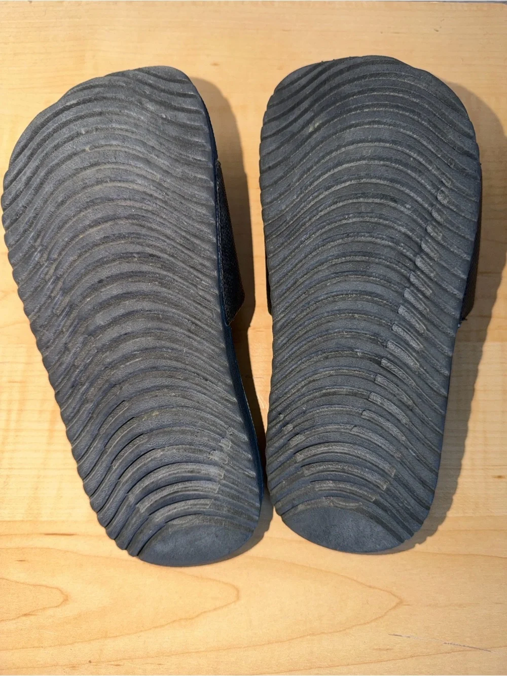 Youth Nike Black Slides with White Swoosh